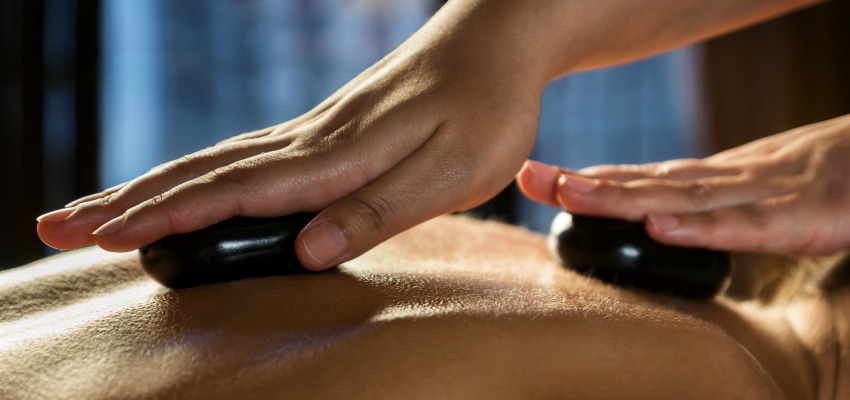 Wrap Up Winter with a Warming Aromatherapy and Hot Stone Massage