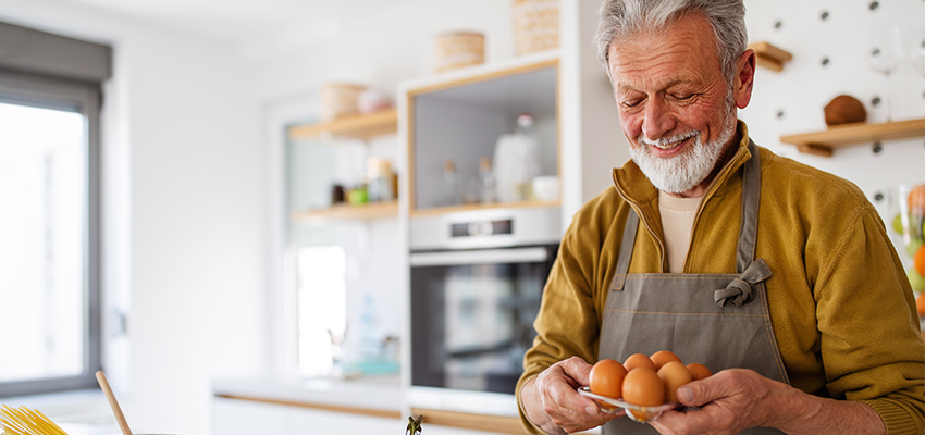 man cooking in kitchen